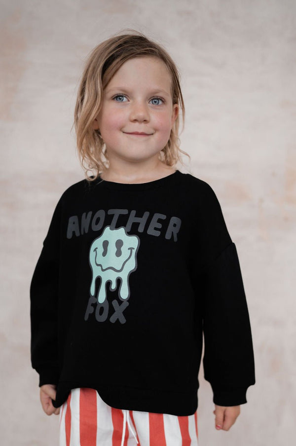 BLACK SMILE FACE SWEATSHIRT